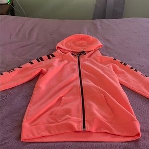 Pink zip up orange hoody size large.
